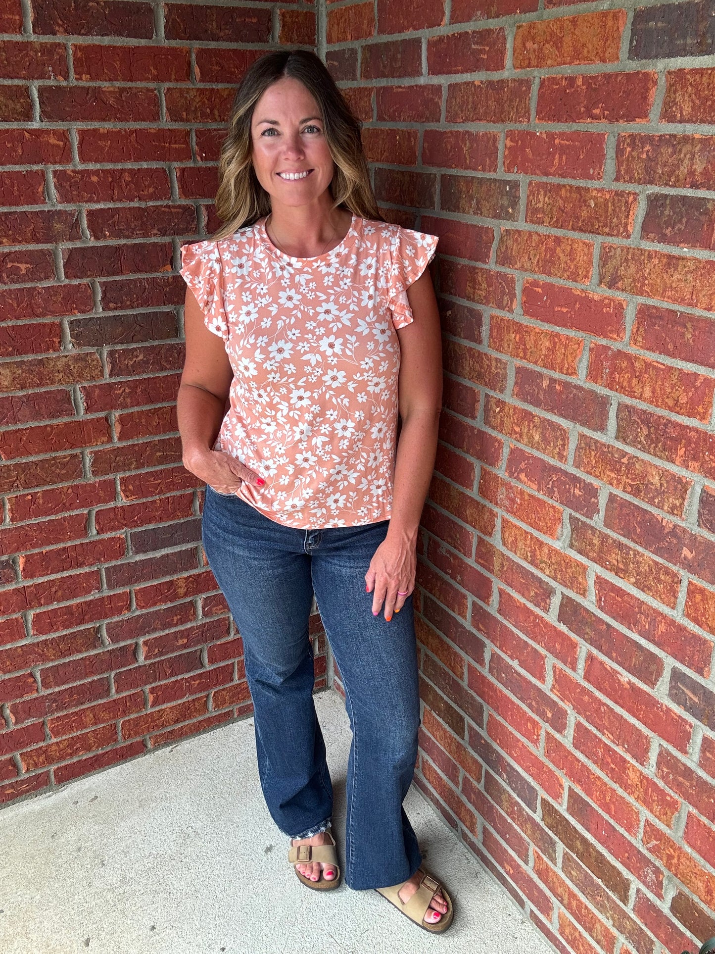 Coral flutter sleeve floral top